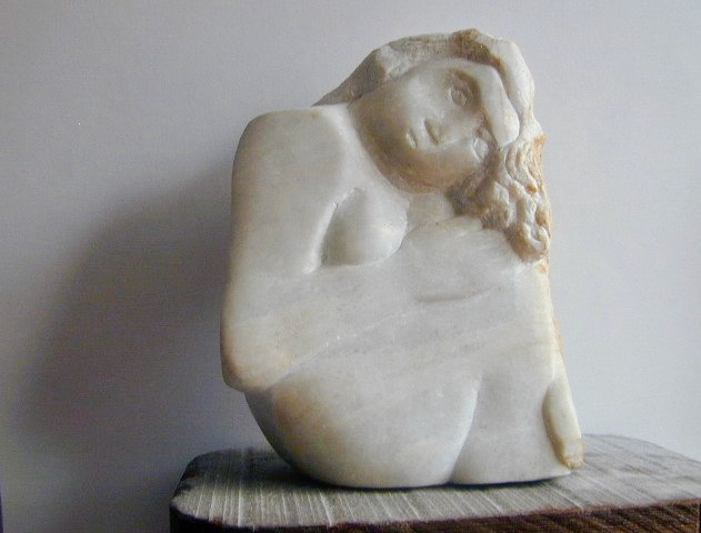 Seated woman — white marble