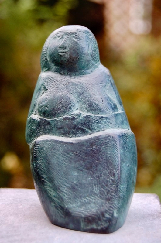 Seated figure — bronze