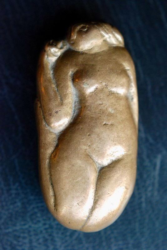 Seated figure — bronze