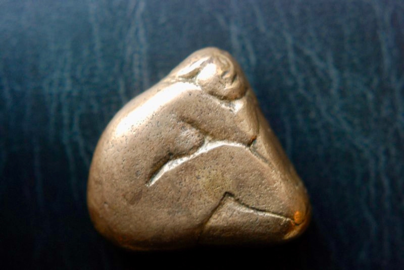 Seated figure — bronze