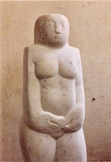 Standing woman — white marble